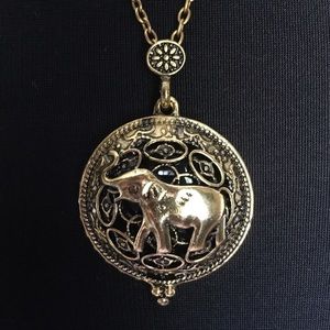 Elephant magnifying pendant